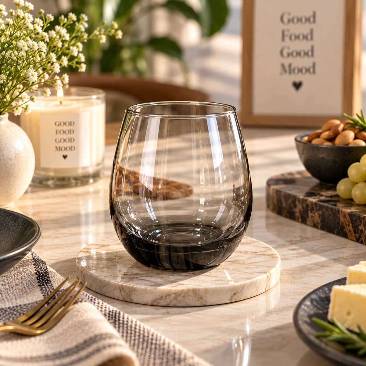 Smoky black stemless drinking glass shown from the side