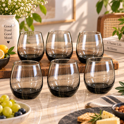 Smoky black stemless drinking glasses shown as a matching set