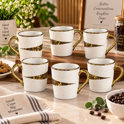 Gold Splatter textured ceramic mugs shown as a full set of 6