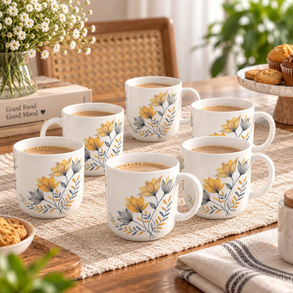 Botanical floral cup filled with tea on a table
