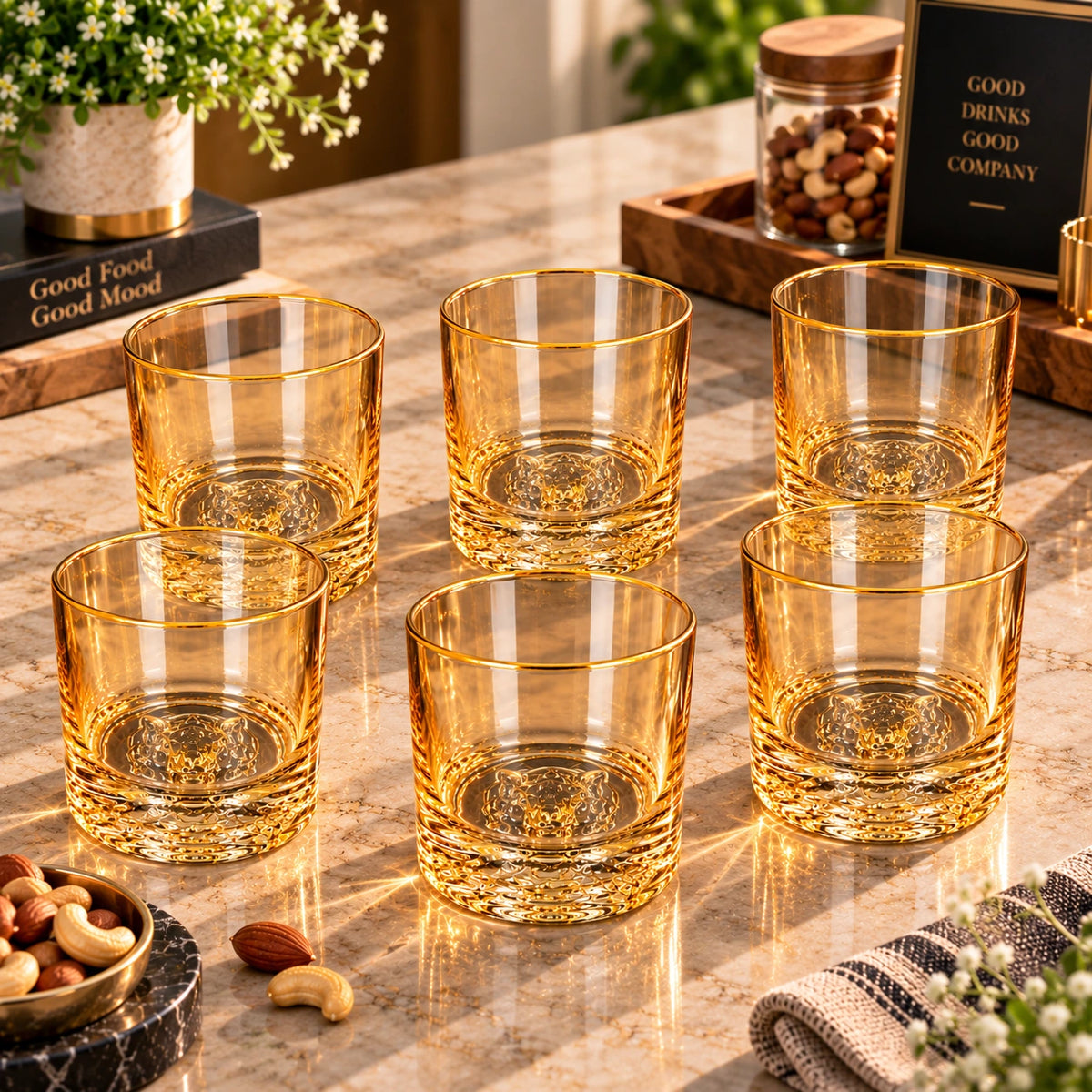 Fox Sculpture amber gold rim glasses shown as a matching set