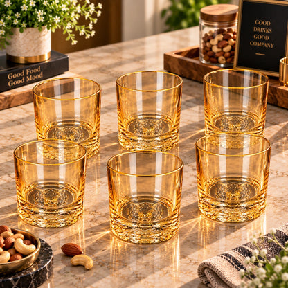 Fox Sculpture amber gold rim glasses shown as a matching set
