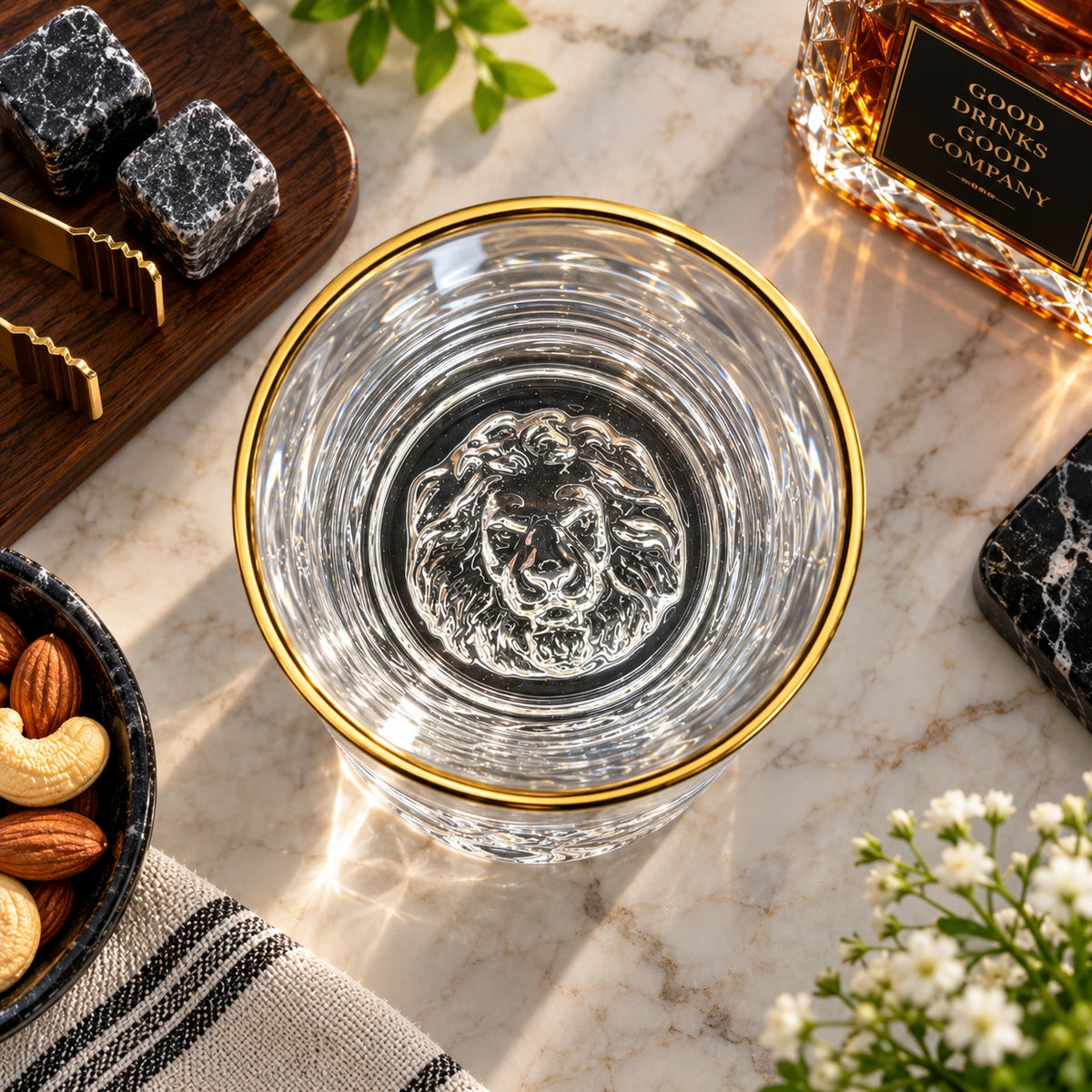 Close-up of the sculpted lion detail on the base of the crystal glass